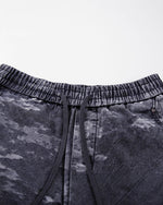 camouflage paneled overalls