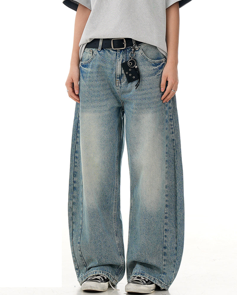 水洗彎刀牛仔褲