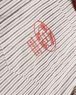 Fake two-piece cape striped long-sleeved shirt