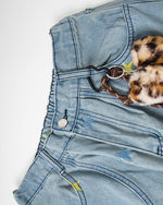 Washed leopard print jeans