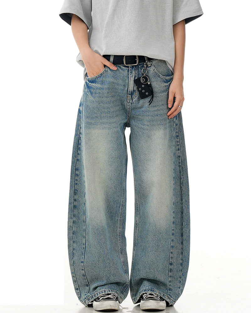 水洗彎刀牛仔褲