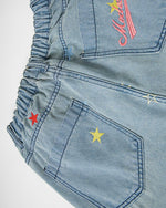 Washed leopard print jeans