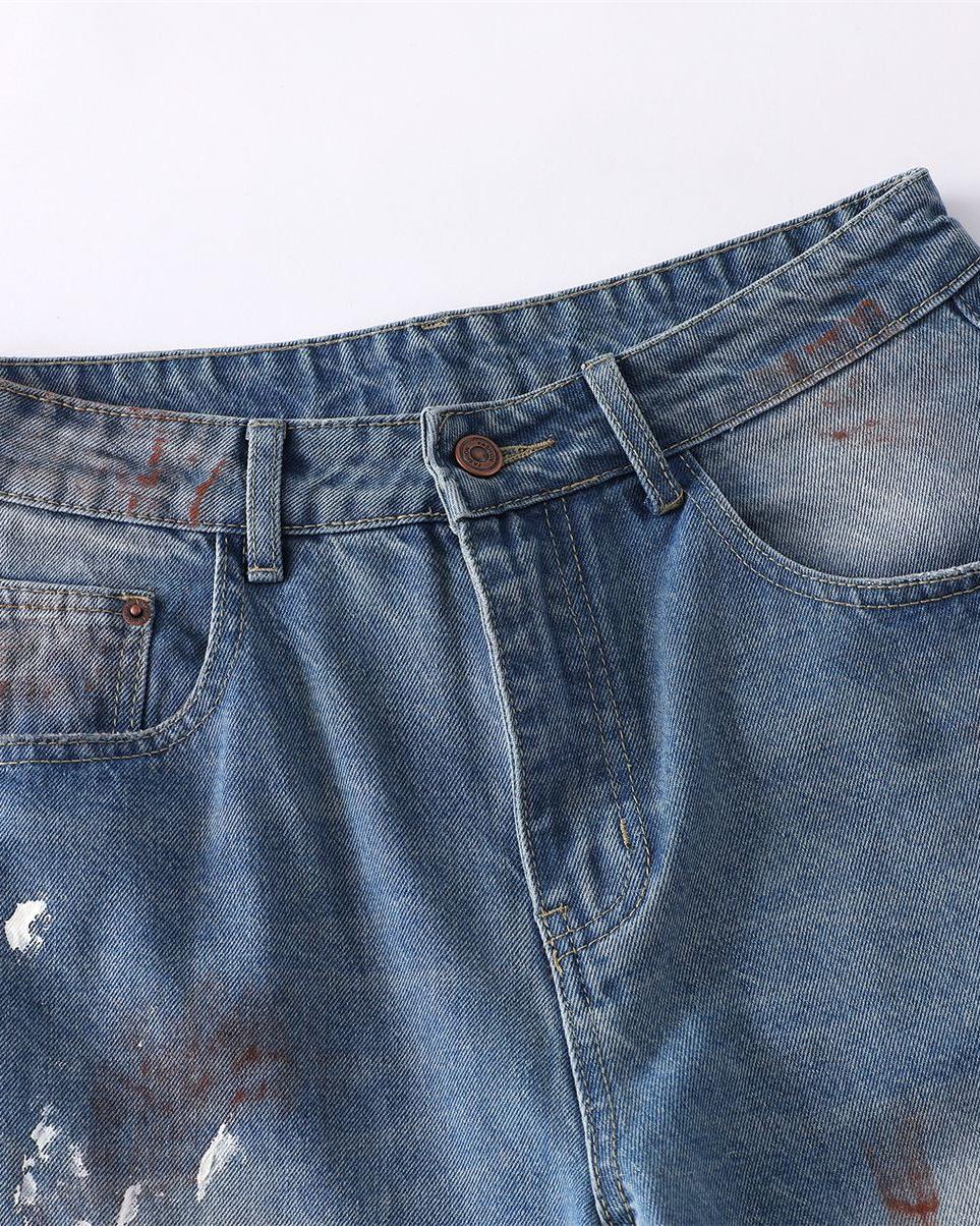Distressed gradient jeans