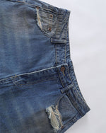 Distressed straight jeans