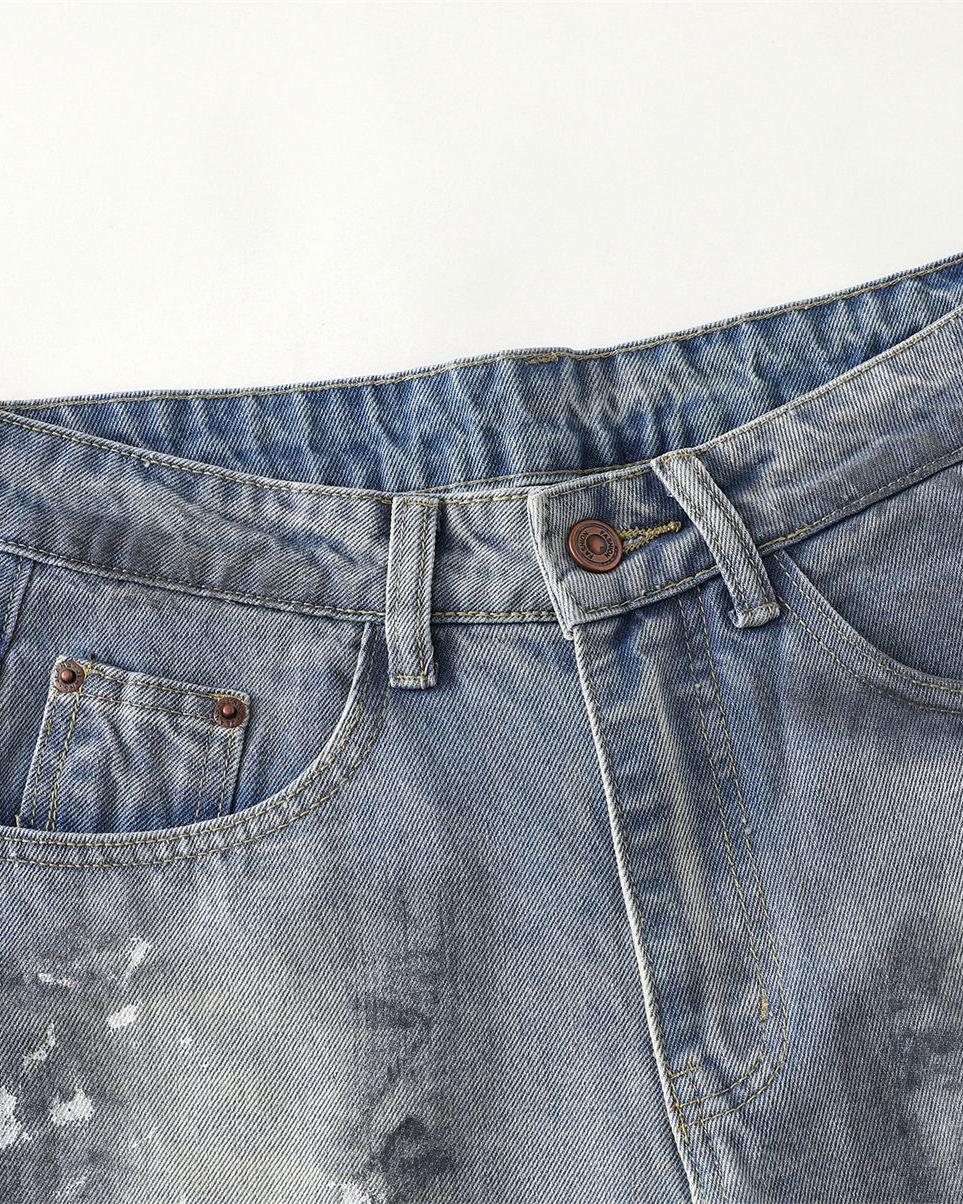 Distressed hand-painted jeans