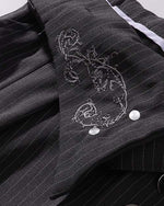 Embroidered striped trousers