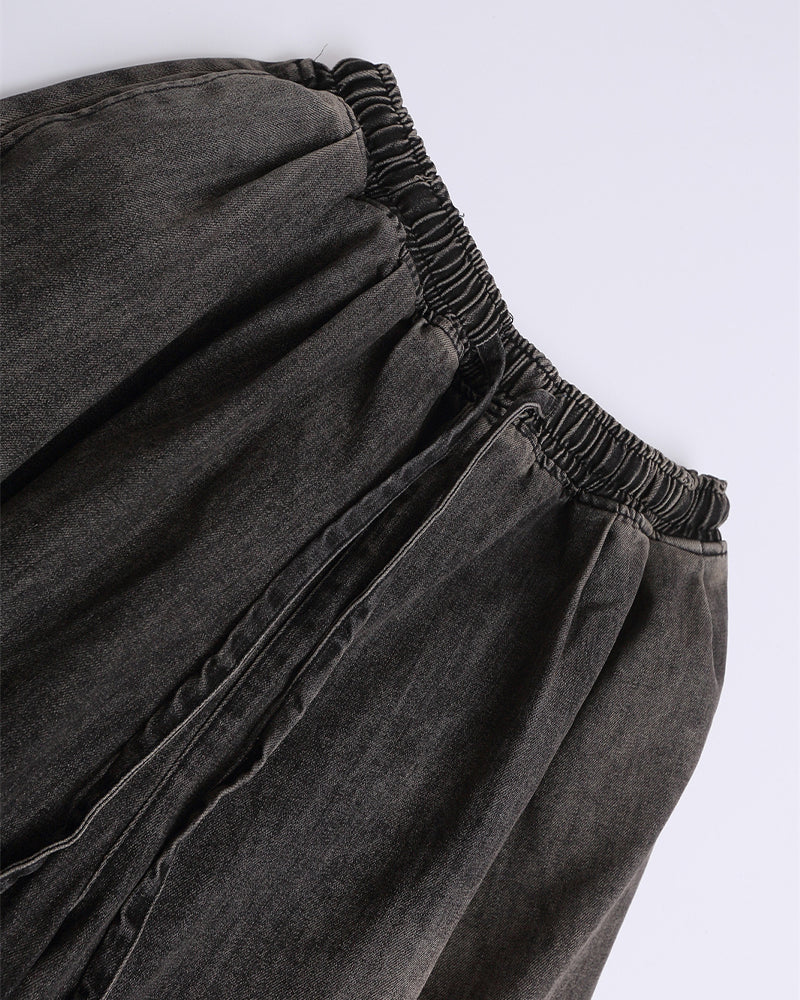 Ripped raw-edge denim shorts