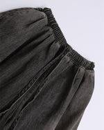 Ripped raw-edge denim shorts