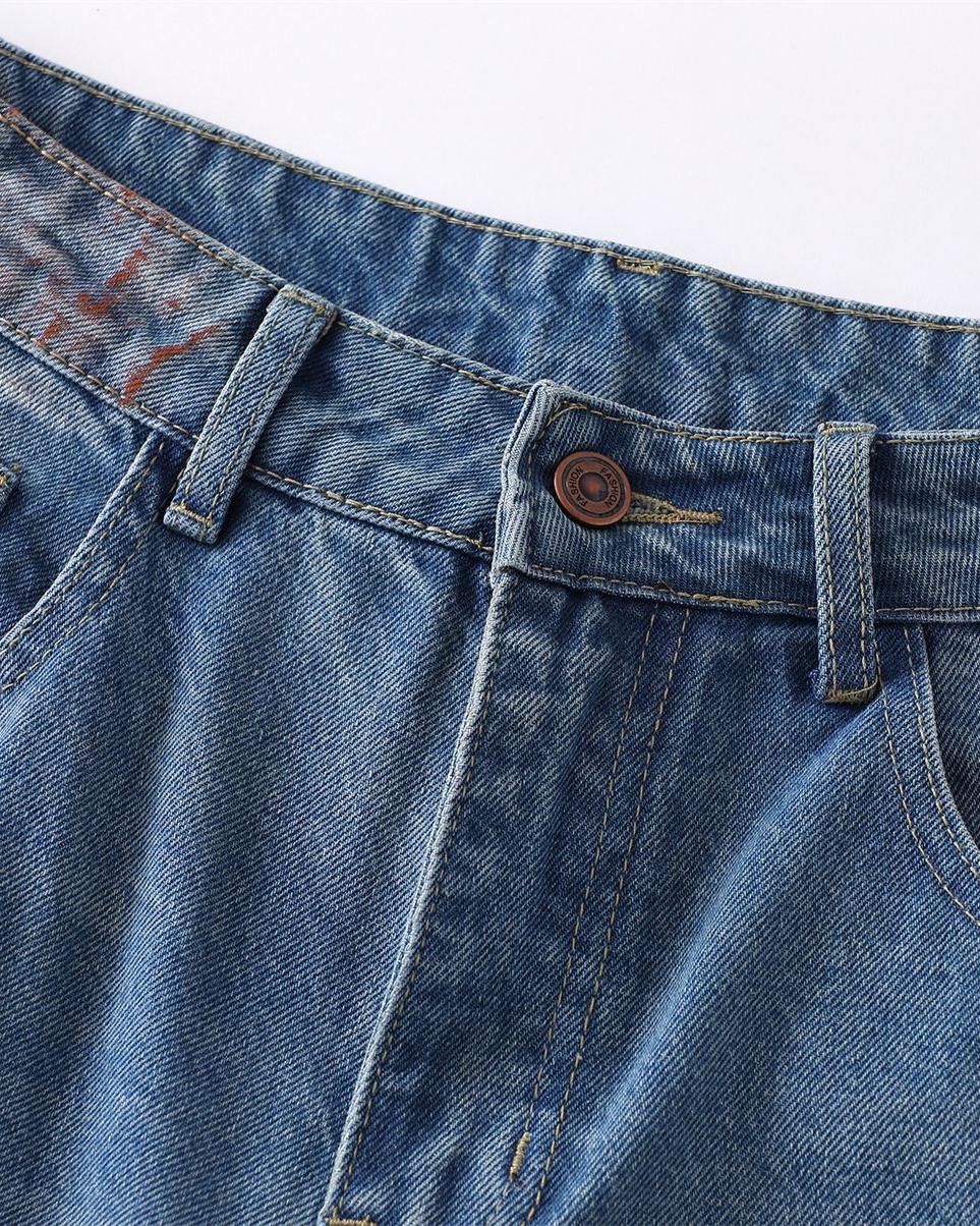 Distressed gradient jeans