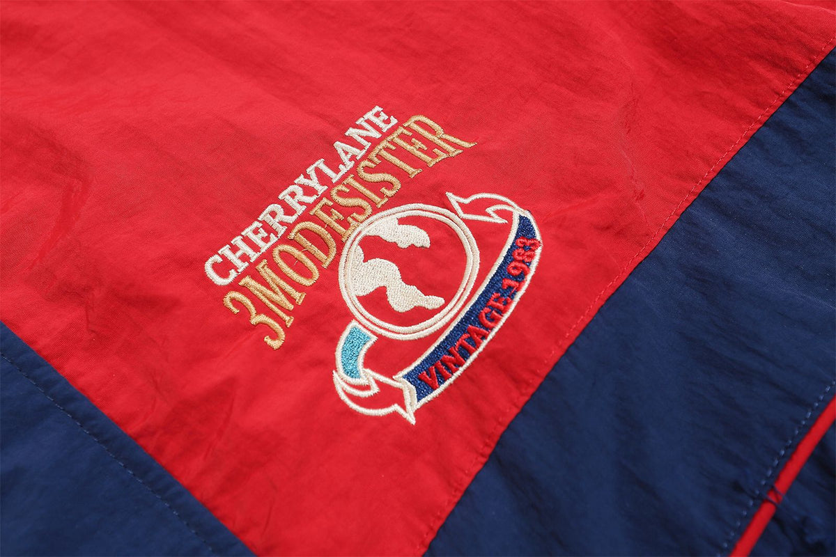 Retro contrasting color patchwork baseball jacket