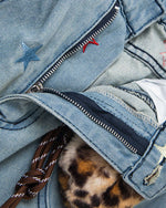 Washed leopard print jeans