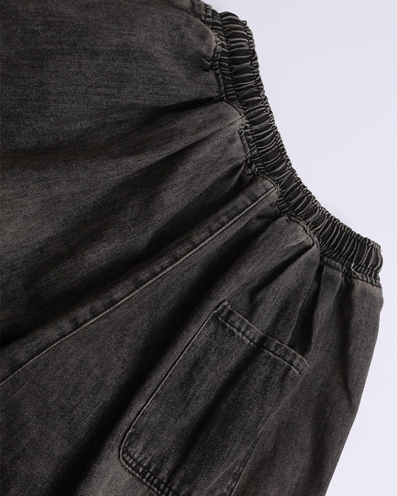 Ripped raw-edge denim shorts