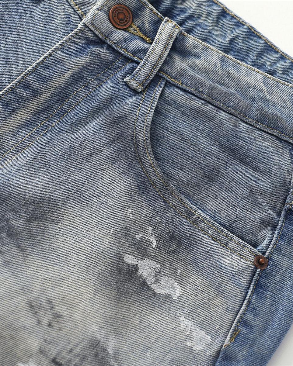 Distressed hand-painted jeans