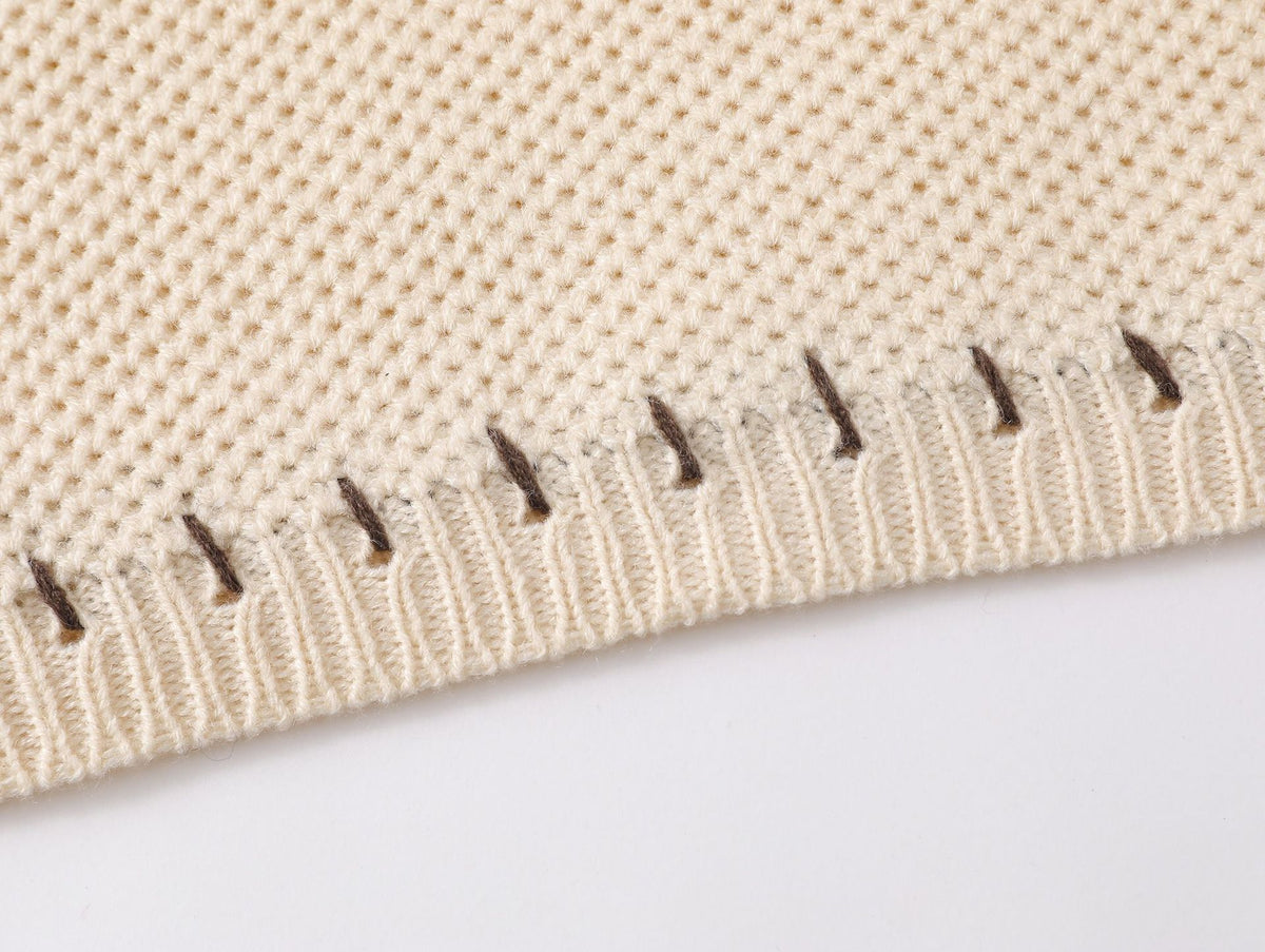 Short knitted sweater (women's style)