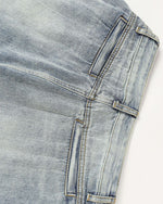 Loose-fitting washed denim jeans
