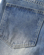 Distressed hand-painted jeans