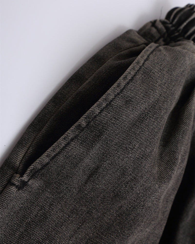 Ripped raw-edge denim shorts