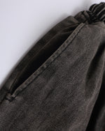 Ripped raw-edge denim shorts