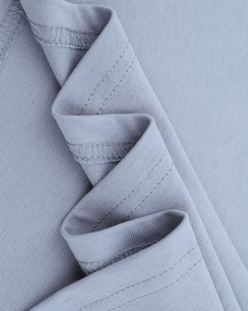 느슨한 대조적인 색상 디자인의 짧은 소매