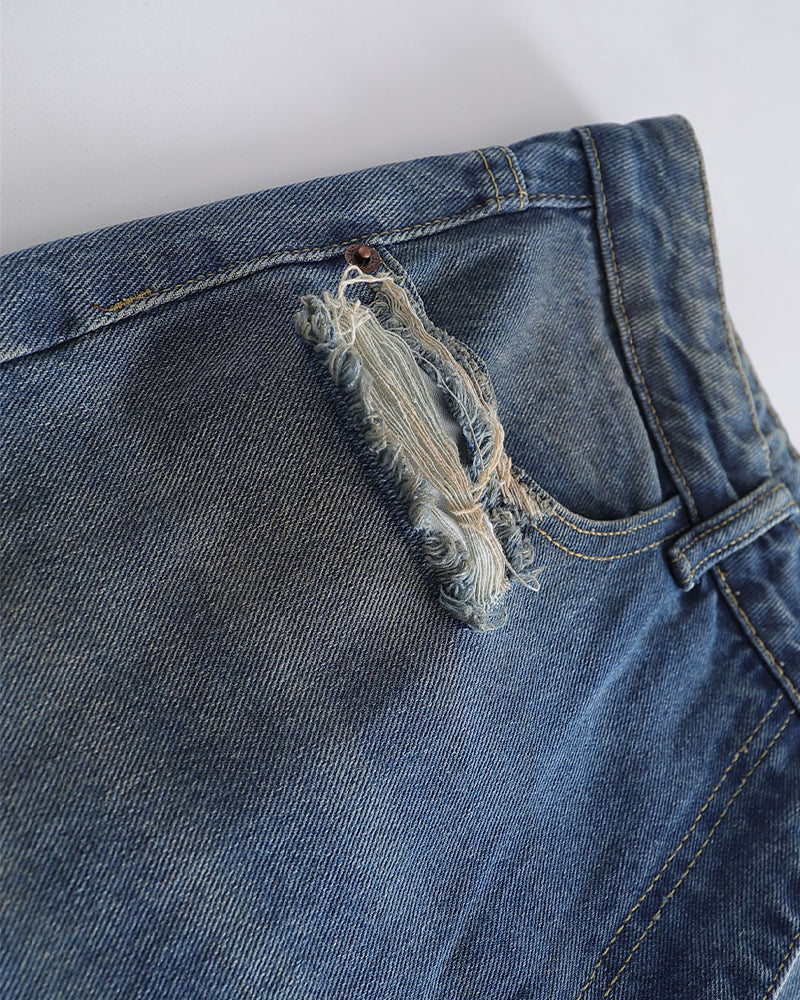 Distressed straight jeans