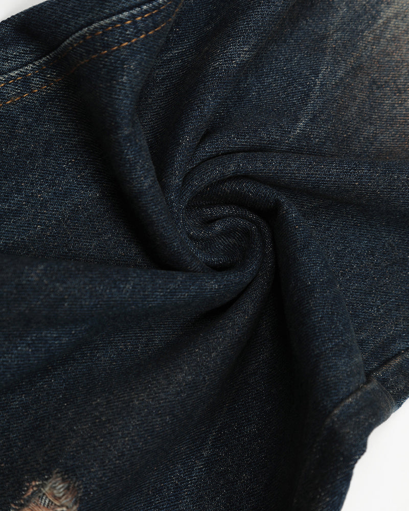 Washed distressed denim trousers