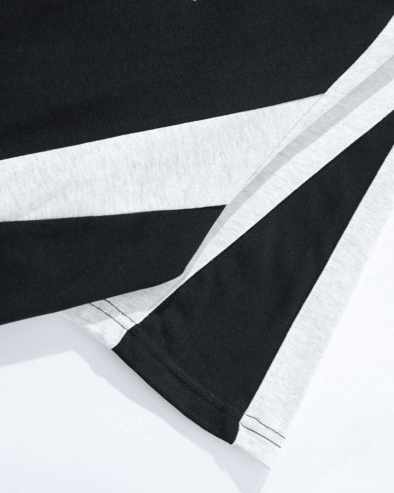 루즈한 반소매와 대비되는 레트로 패치워크