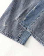 Distressed hand-painted jeans