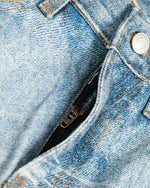 Designer-style denim trousers