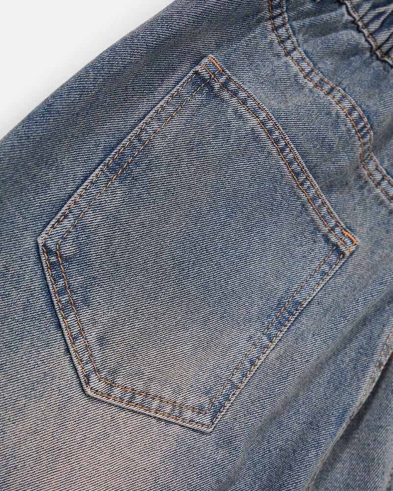 Distressed straight jeans