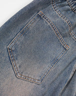 Distressed straight jeans