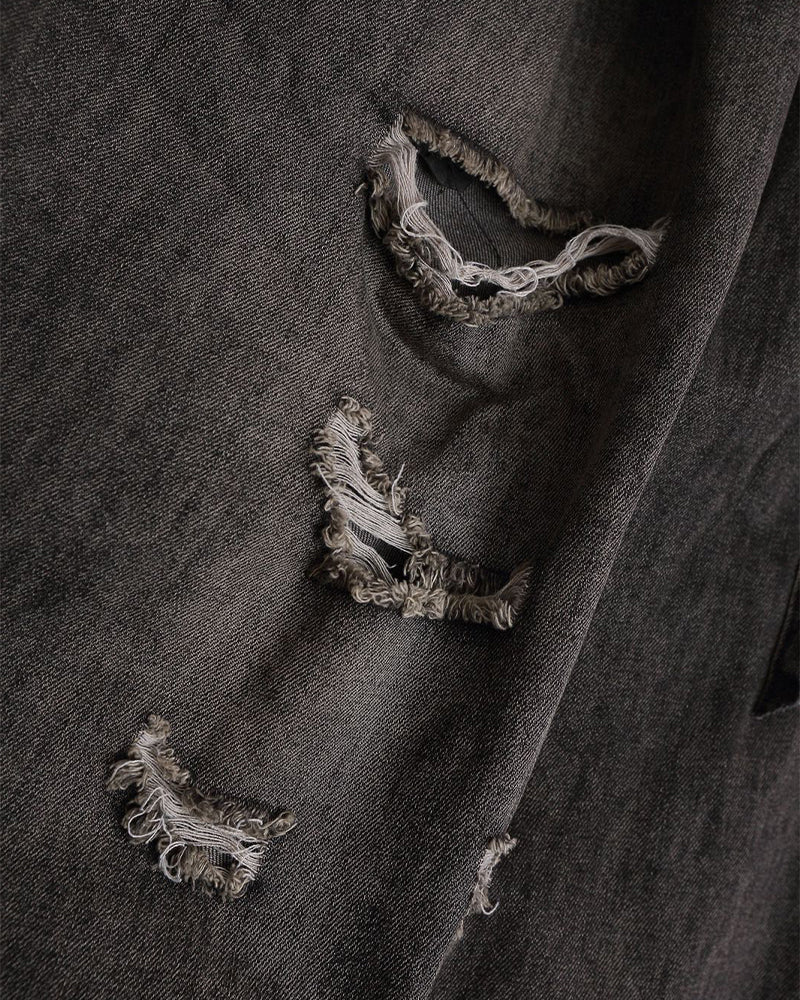 Ripped raw-edge denim shorts