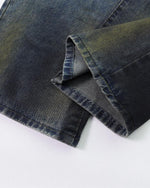 Distressed straight jeans