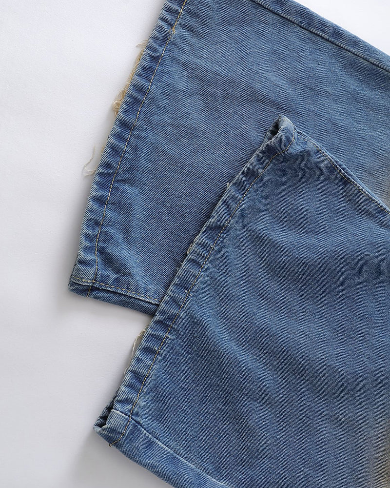 Distressed straight jeans