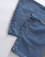 Distressed straight jeans