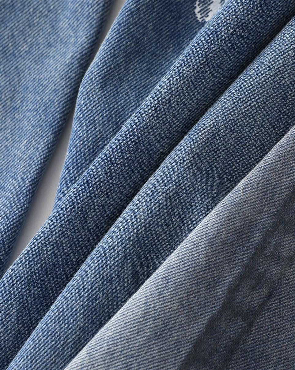 Distressed hand-painted jeans