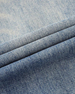 Vintage washed denim trousers