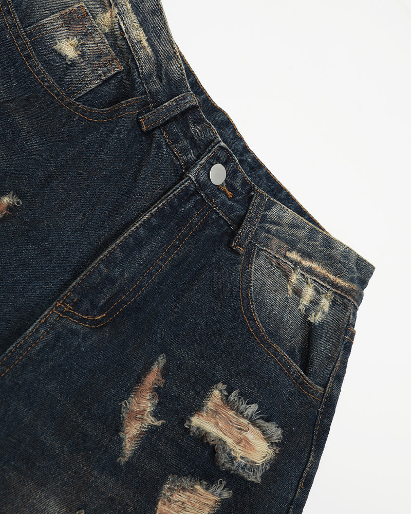 Washed distressed denim trousers