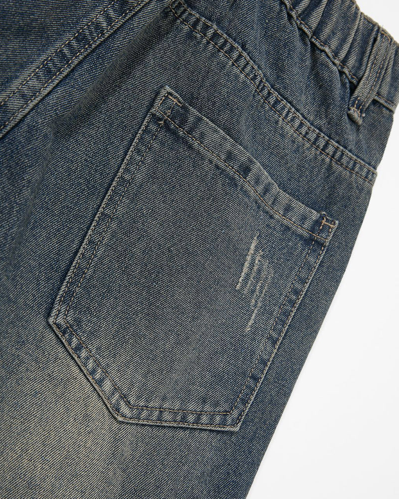 Distressed multi-pocket jeans