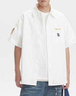 Badge embroidered short-sleeved shirt