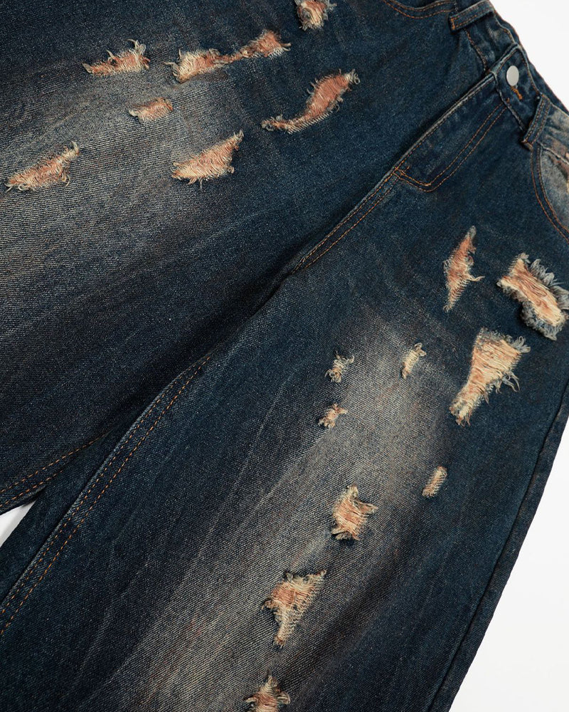 Washed distressed denim trousers