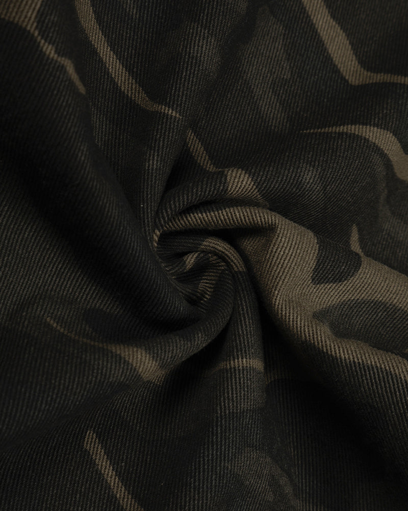 Distressed patchwork camouflage trousers
