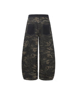 Distressed patchwork camouflage trousers