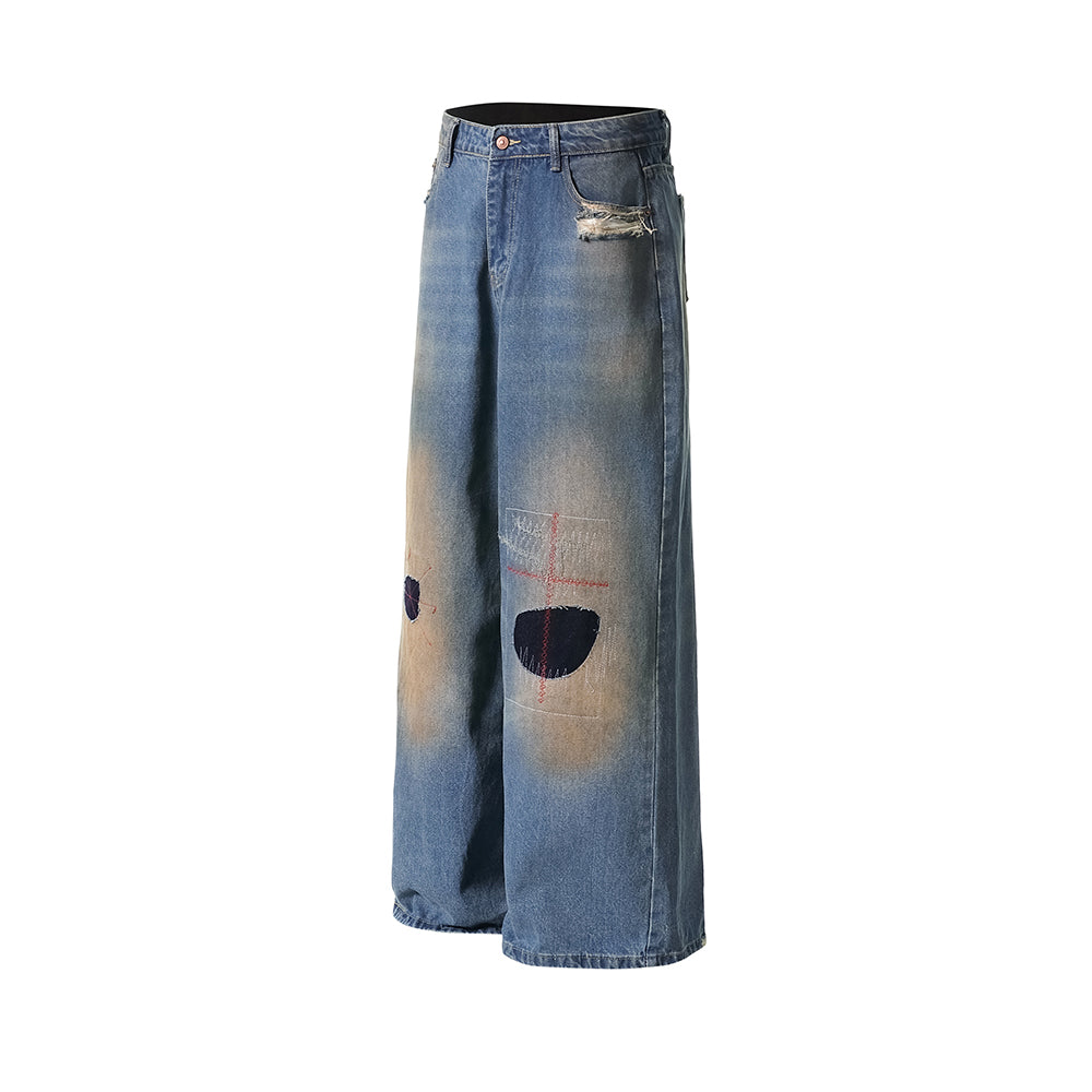 Distressed straight jeans