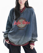 Color-blocked leopard print denim sweatshirt