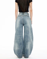 Loose-fitting washed denim jeans