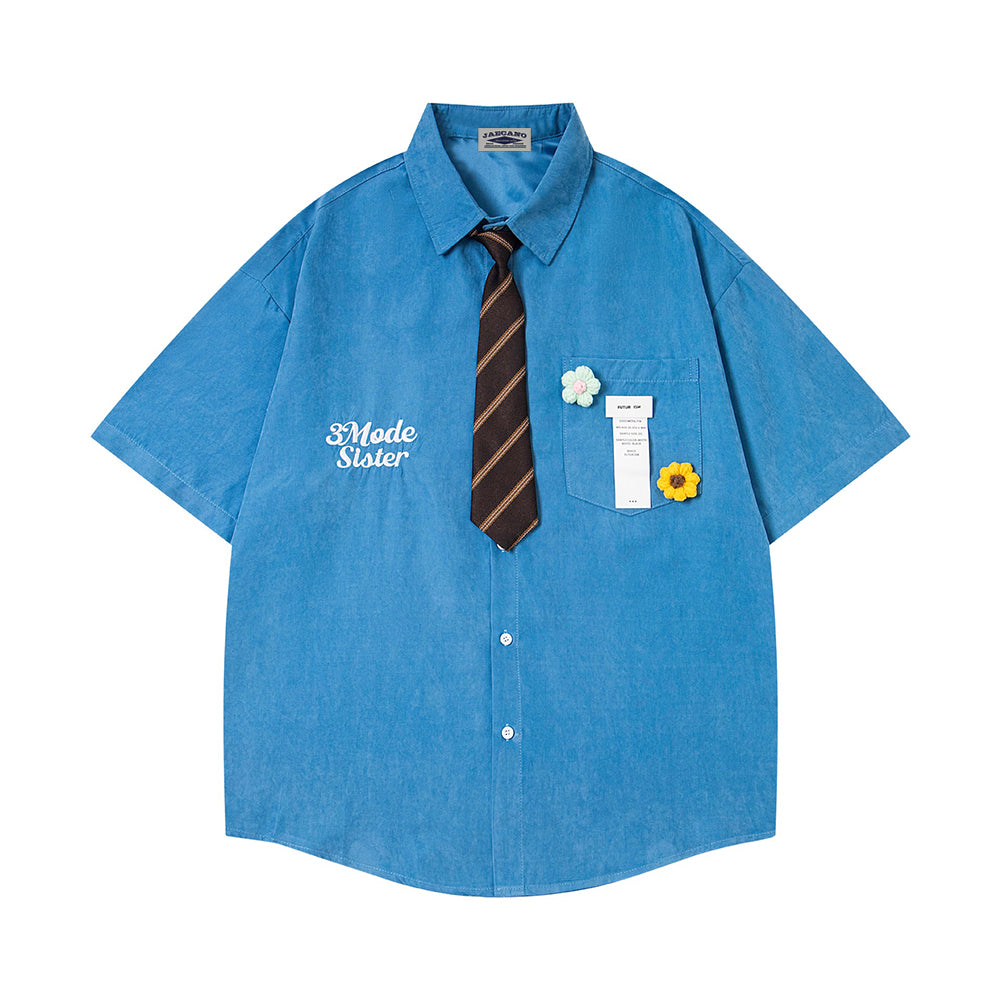 Short-sleeved shirt with small embroidered flowers