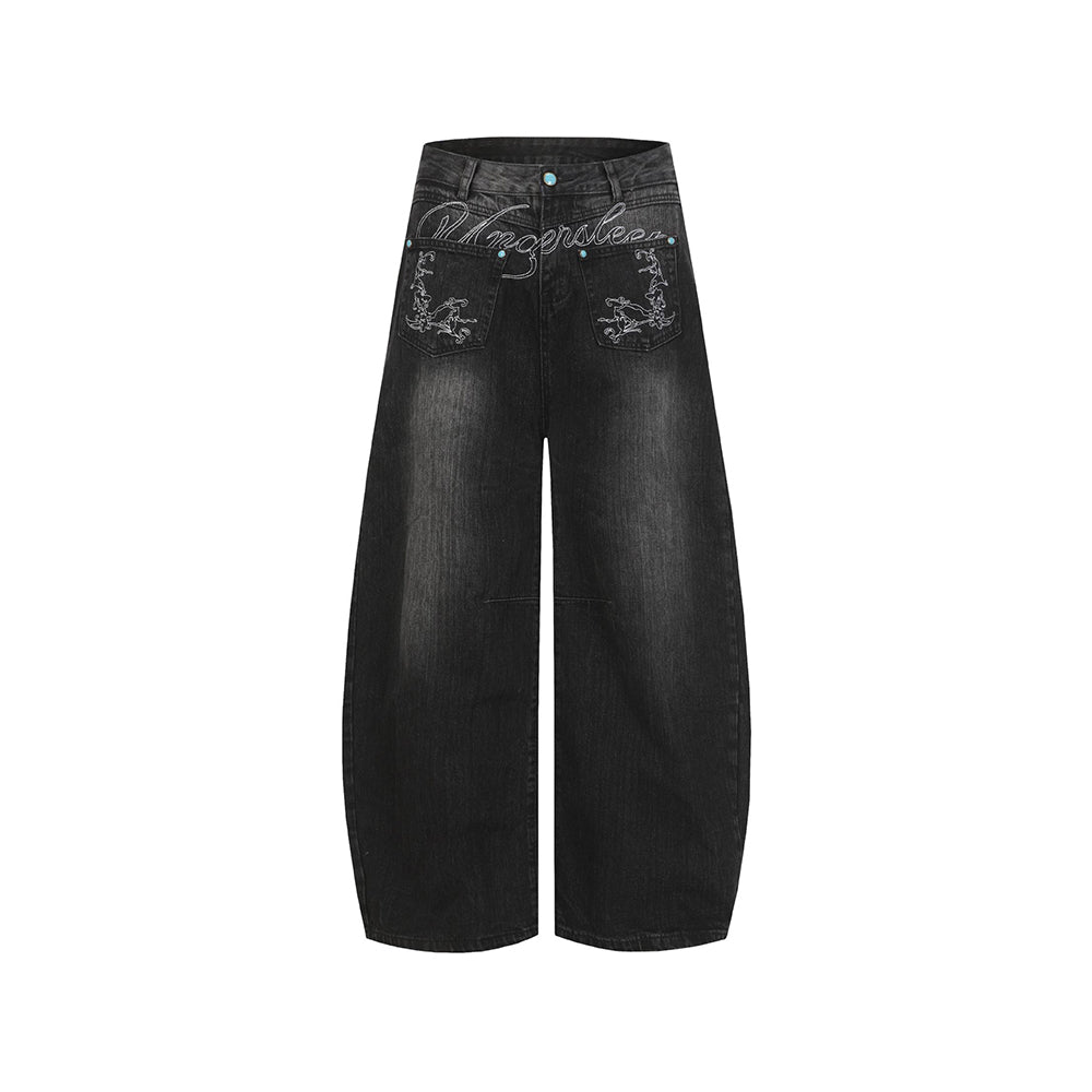 Loose-fitting washed denim jeans