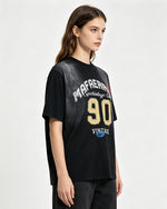 Embroidered distressed short-sleeved shirt