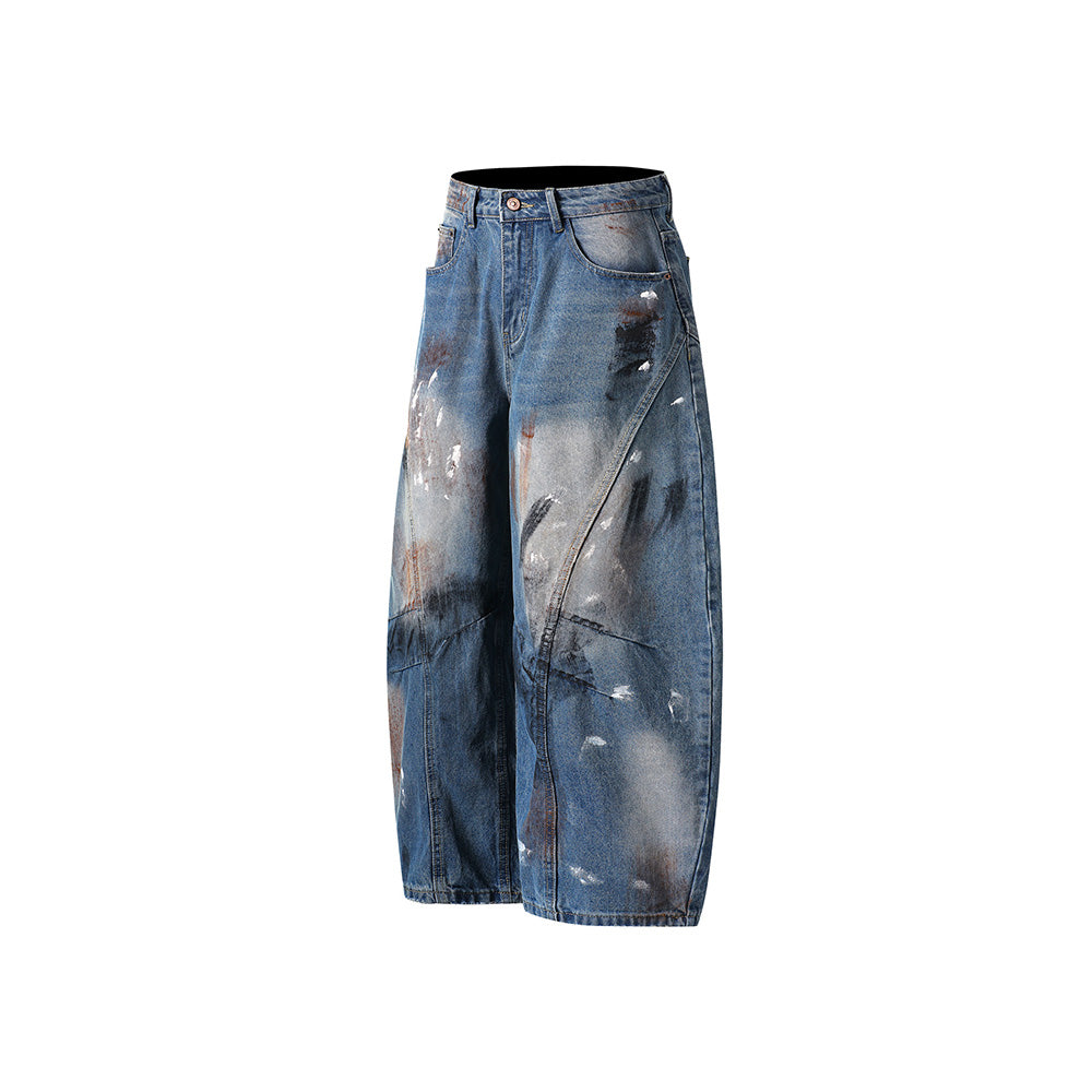 Distressed gradient jeans