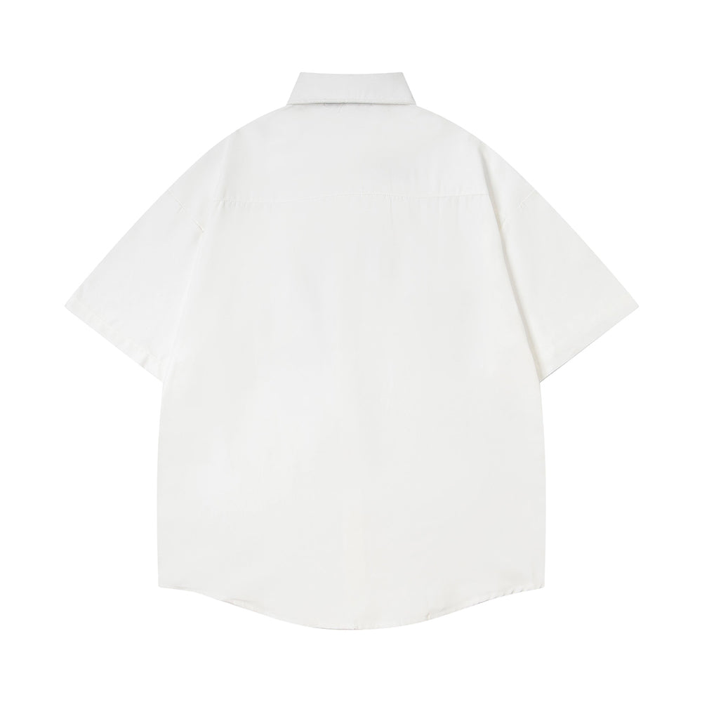 Short-sleeved shirt with small embroidered flowers